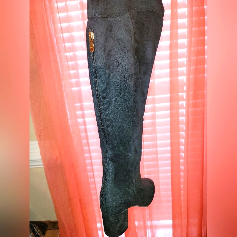 Knee high black boots